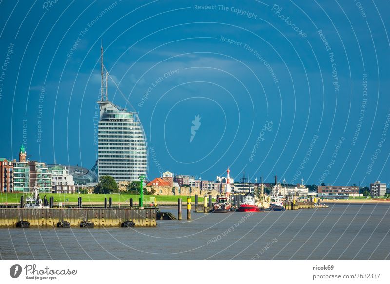 View of the city of Bremerhaven Relaxation Vacation & Travel Tourism House (Residential Structure) Clouds Coast North Sea Town Harbour Lighthouse Building