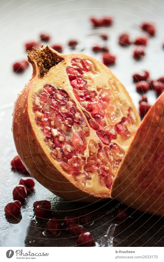 pomegranate cut open Food Fruit Organic produce Vegetarian diet Diet Healthy Eating To enjoy Fresh Round Red Belief Religion and faith Kernels & Pits & Stones