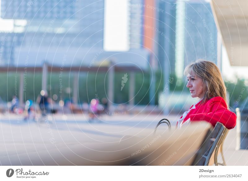 Blonde relaxed businesswoman sitting on a bench in the city Lifestyle Beautiful Calm Meditation Business Human being Feminine Woman Adults Park Shirt Skirt