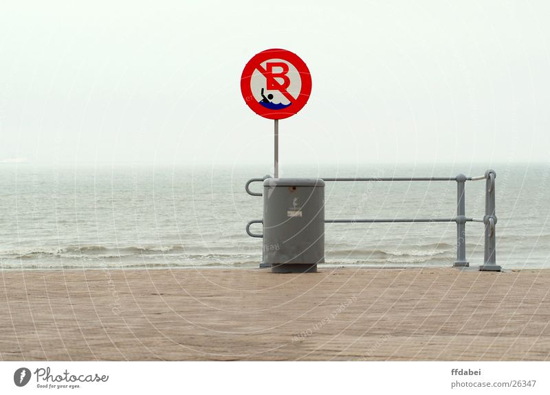 bathing prohibited Beach Ocean Bans Wastepaper basket Bad weather Belgium Gray Dreary Red Nature Landscape Water North Sea Signs and labeling Swimming & Bathing