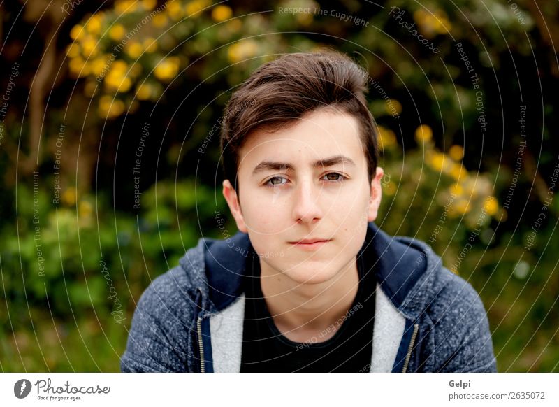 Attractive teenager guy in a park with green plant Lifestyle Style Happy Beautiful Hair and hairstyles Face Summer Human being Boy (child) Man Adults