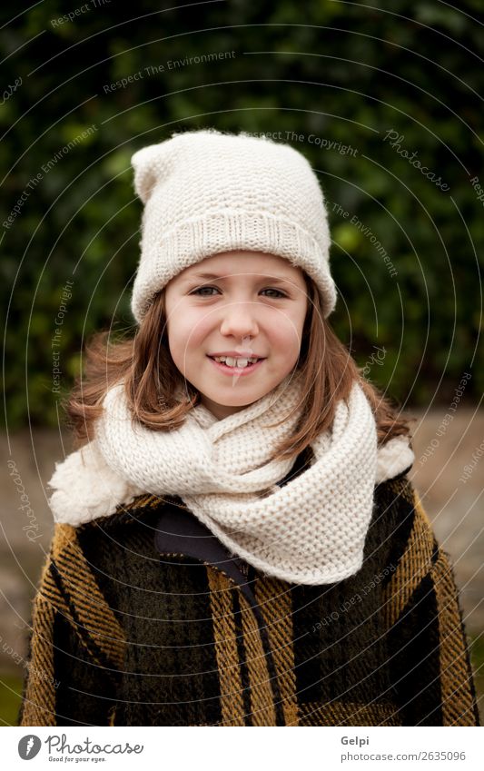 Pretty girl with wool hat in a park Joy Happy Beautiful Face Winter Garden Child Human being Toddler Woman Adults Family & Relations Infancy Nature Autumn