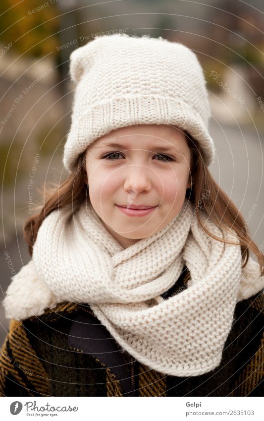 Pretty girl with wool hat in a park Joy Happy Beautiful Face Winter Garden Child Human being Toddler Woman Adults Family & Relations Infancy Nature Autumn