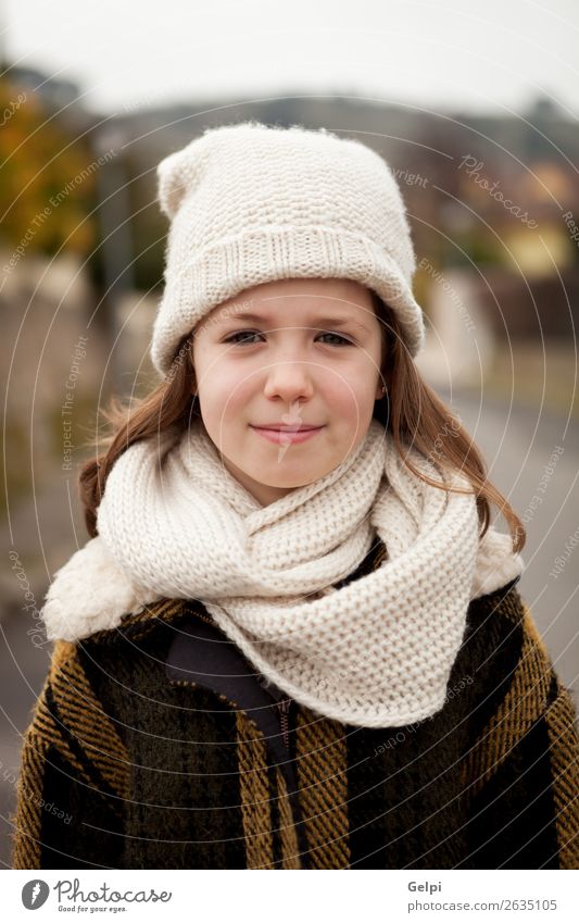 Pretty girl with wool hat in a park Joy Happy Beautiful Face Winter Garden Child Human being Toddler Woman Adults Family & Relations Infancy Nature Autumn