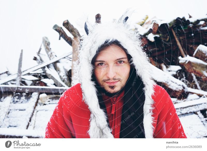 Young and attractive man enjoying a snowy winter day Lifestyle Style Happy Winter Snow Winter vacation Human being Masculine Young man Youth (Young adults) Man