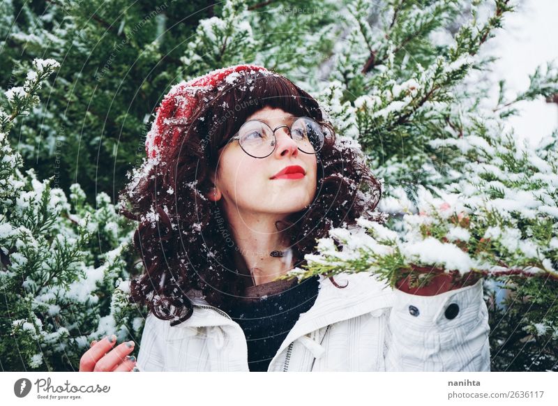 Young woman enjoying a snowy winter day Lifestyle Style Happy Adventure Freedom Winter Snow Christmas & Advent New Year's Eve Human being Feminine