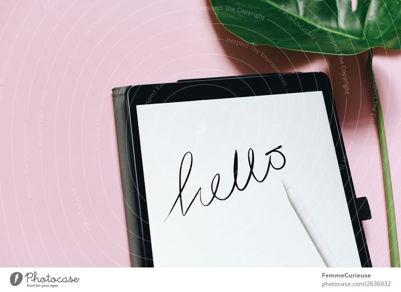 Tablet with a handwritten "hello" on pink background Technology Entertainment electronics Advancement Future Stationery Paper Creativity Salutation Handwriting