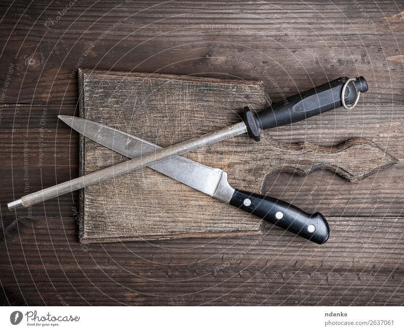 brown wooden kitchen cutting board - a Royalty Free Stock Photo