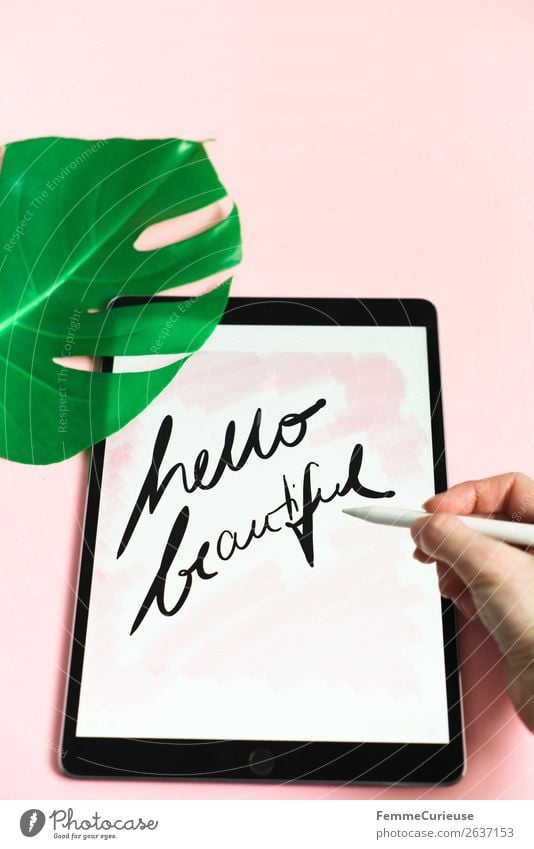 Tablet with a handwritten "hello beautiful" on pink background Lifestyle Technology Entertainment electronics Advancement Future Stationery Paper Communicate