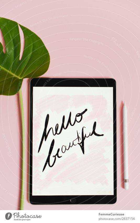 Tablet with a handwritten "hello beautiful!" on pink background Technology Entertainment electronics Advancement Future Nature Communicate Handwriting
