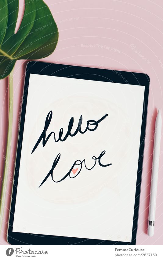 Tablet with a handwritten "hello love" on pink background Technology Entertainment electronics Advancement Future Internet Communicate Design