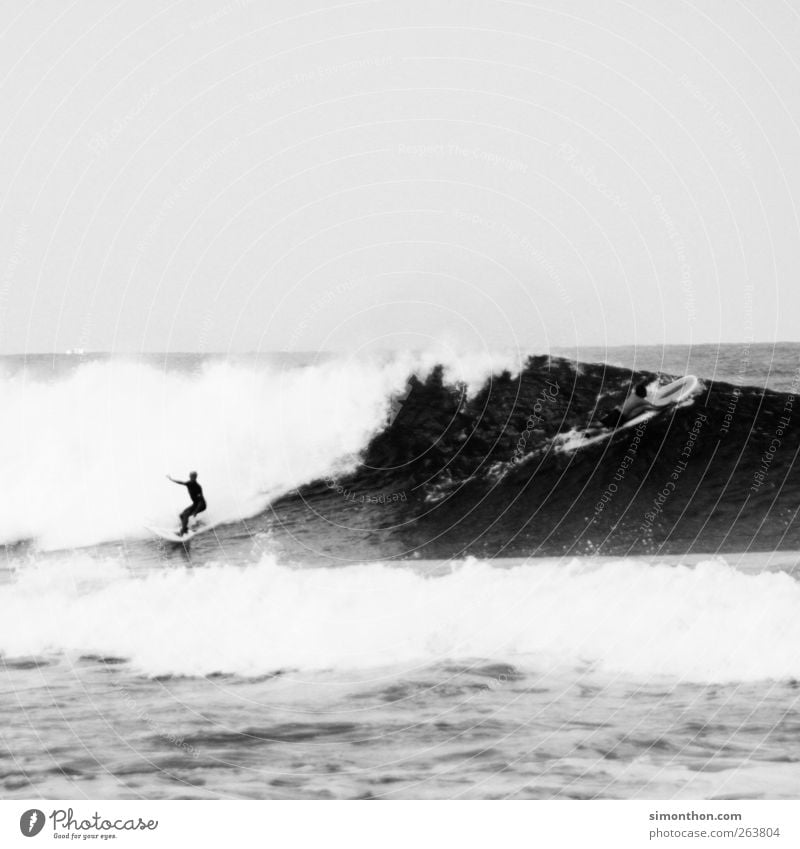 surfer 1 Human being Life Surfer Surfing Surfboard Surf school Ocean Sea water Waves Wind Vacation & Travel Sports Action Balance Water Black & white photo