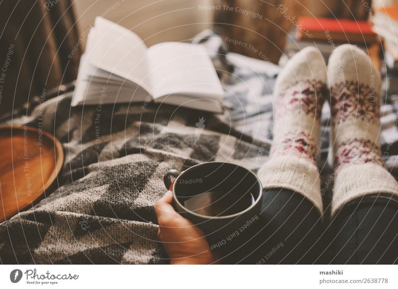cozy winter day at home with cup of hot tea Tea Lifestyle Relaxation Leisure and hobbies Reading Winter House (Residential Structure) Woman Adults Feet Book