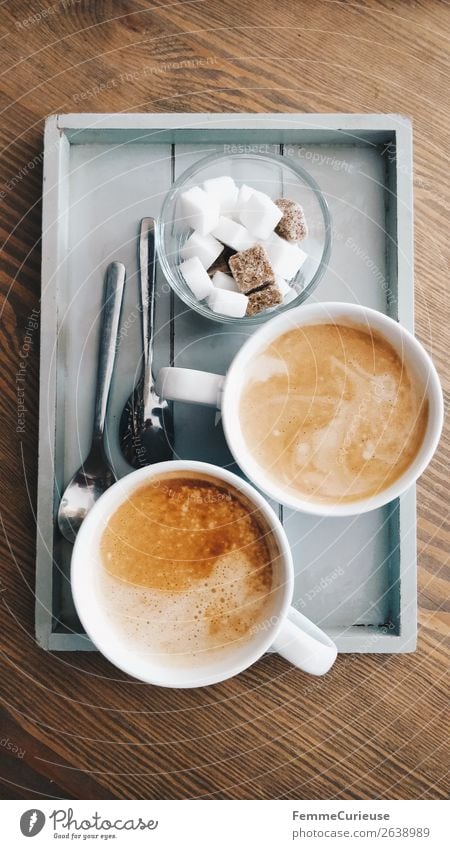 Two delicious cups of coffee on a small wooden tray Food Beverage Hot drink Coffee To enjoy To have a coffee Coffee cup Breakfast Sugar Lump sugar Tray Spoon