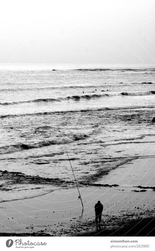 anglers 1 Human being Infinity Fishing (Angle) Fishing rod Spoon bait Deep-sea fishermen Fisherman Ocean Coast Loneliness Man Patient Black & white photo