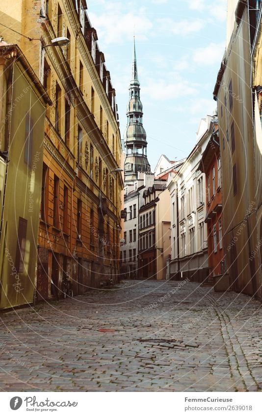 Lane in Riga with view to the Petri church Town Capital city Culture Travel photography Latvia Sv&#275;t&#257; P&#275;tera bazn&#299;ca Sightseeing Paving stone