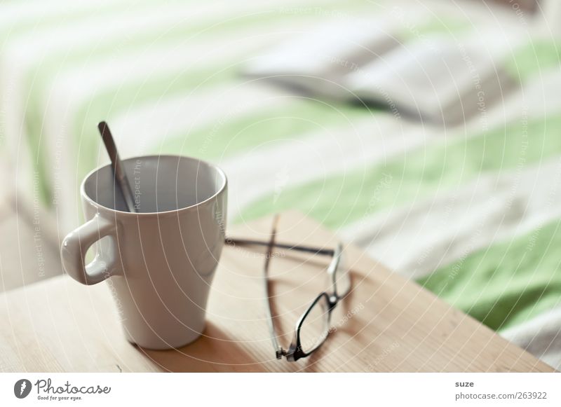 Quiet minute Beverage Coffee Tea Cup Leisure and hobbies Reading Living or residing Sofa Bed Table Book Eyeglasses Bright Relaxation Break Calm Know Afternoon