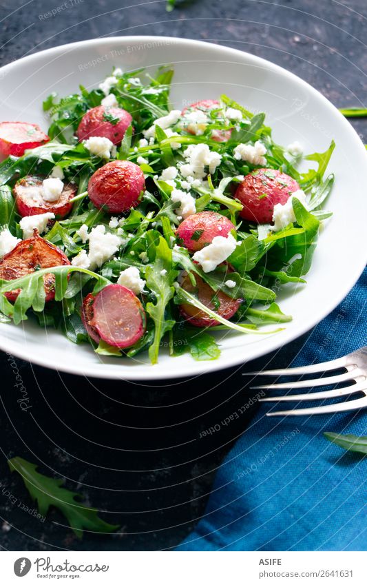 Arugula salad with roasted radishes and feta cheese Cheese Vegetable Nutrition Lunch Dinner Vegetarian diet Diet Plate Fork Summer Old Fresh Blue Green Pink
