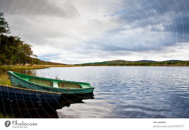 boat Nature Landscape Elements Water Sky Clouds Storm clouds Weather Lakeside Rowboat Natural Blue Green Colour photo Exterior shot Aerial photograph Deserted
