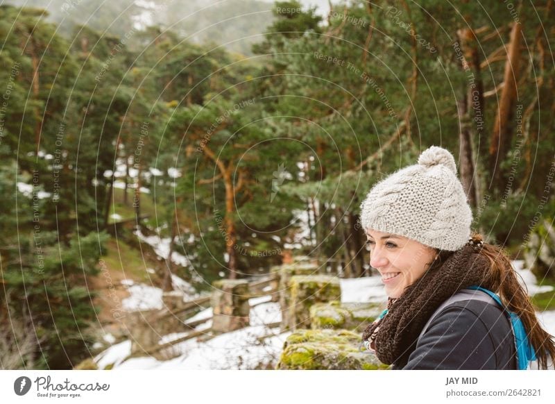Hiking, woman hiker enjoying the scenery in the snowy forest Lifestyle Happy Beautiful Vacation & Travel Tourism Trip Adventure Freedom Winter Snow