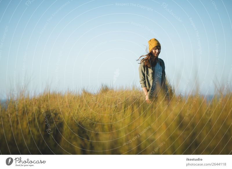 Yellow cap women Lifestyle Happy Beautiful Vacation & Travel Adventure Freedom Ocean Hiking Success Human being Woman Adults Nature Landscape Autumn Grass Coast