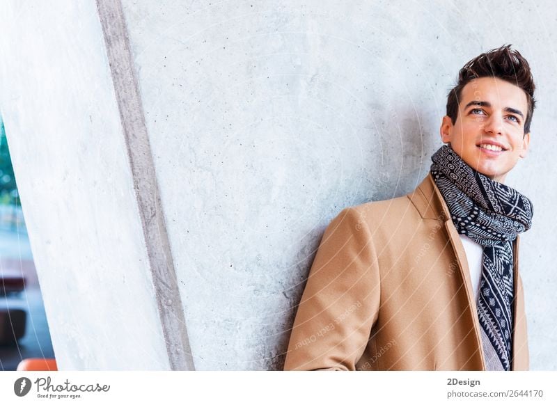 Young man wearing winter clothes in the street stock photo (185638