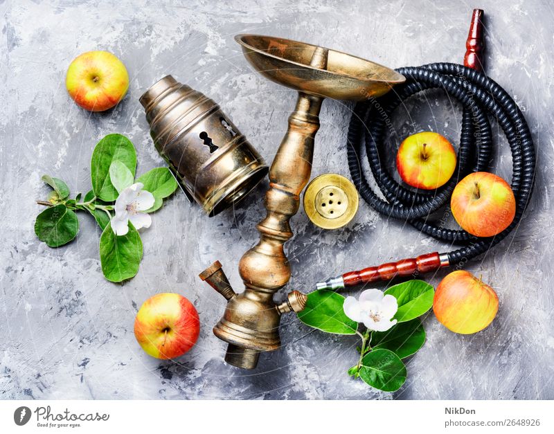 Hookah with apple hookah tobacco kalian smoke shisha east relaxation fruit blossom arabic mouthpiece pipe style turkish hookah lounge lifestyle exotic leisure