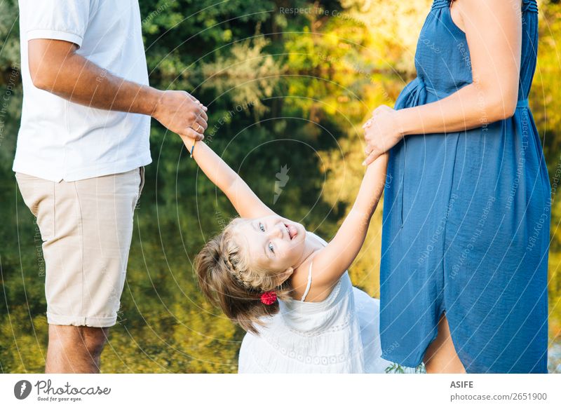 Funny pregnant family near a river in summer Lifestyle Joy Happy Beautiful Playing Summer Child Baby Toddler Woman Adults Man Mother Father Family & Relations