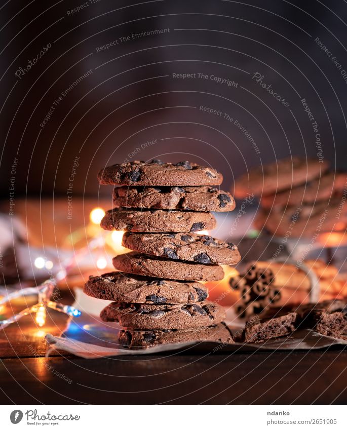 round chocolate cookies in a stack Food Cake Dessert Candy Chocolate Breakfast Feasts & Celebrations Christmas & Advent Wood Eating Dark Delicious Brown Moody