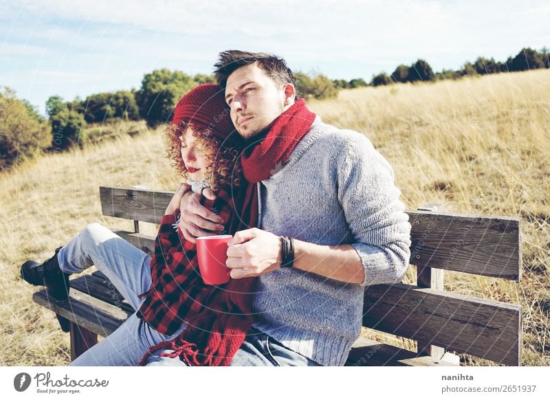 A couple of happy young people in love Coffee Tea Lifestyle Happy Relaxation Calm Sunbathing Human being Masculine Feminine Woman Adults Man Family & Relations