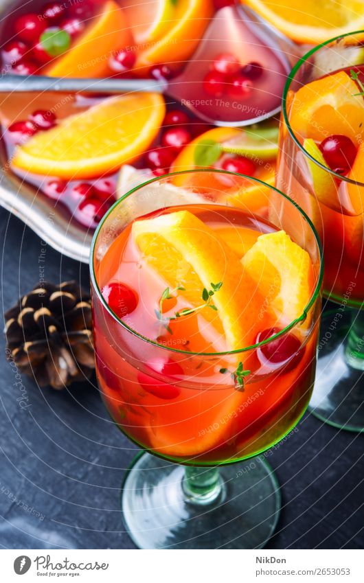 Mulled wine drink sangria mulled wine red orange alcohol beverage glass punch sweet holiday christmas fruit spice winter hot anise traditional xmas citrus warm