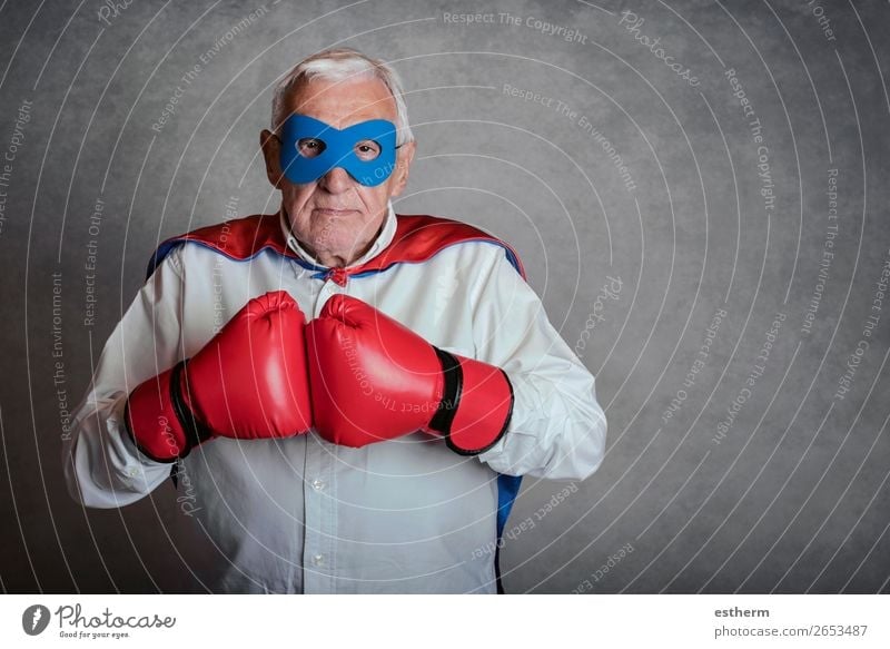 senior man with boxing gloves on gray background Lifestyle Playing Adventure Freedom Feasts & Celebrations Fairs & Carnivals Success Retirement Human being