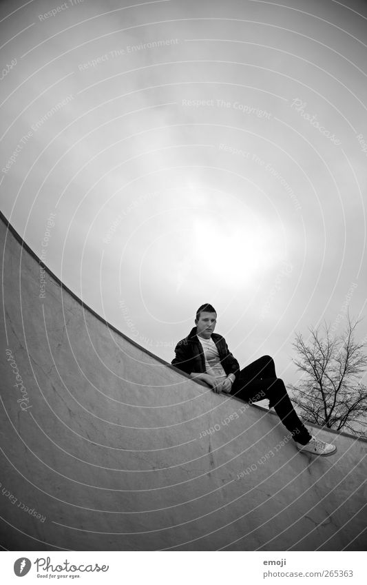 hanging around Masculine Young man Youth (Young adults) 1 Human being Sky Clouds Cool (slang) Dark Round Arch Sit Lie Hang Concrete Concrete wall