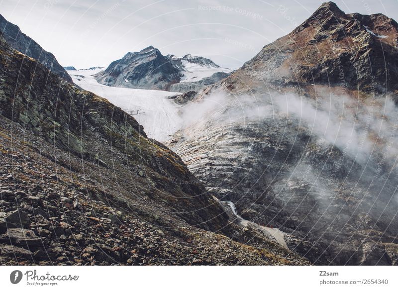 Pitztal Glacier | E5 Adventure Mountain Hiking Nature Landscape Clouds Autumn Bad weather Fog Alps Peak Gigantic Tall Loneliness Sustainability Environment