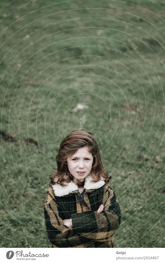 Beautiful girl with coat Joy Happy Face Winter Garden Child Human being Toddler Woman Adults Family & Relations Infancy Nature Autumn Warmth Grass Park Fashion