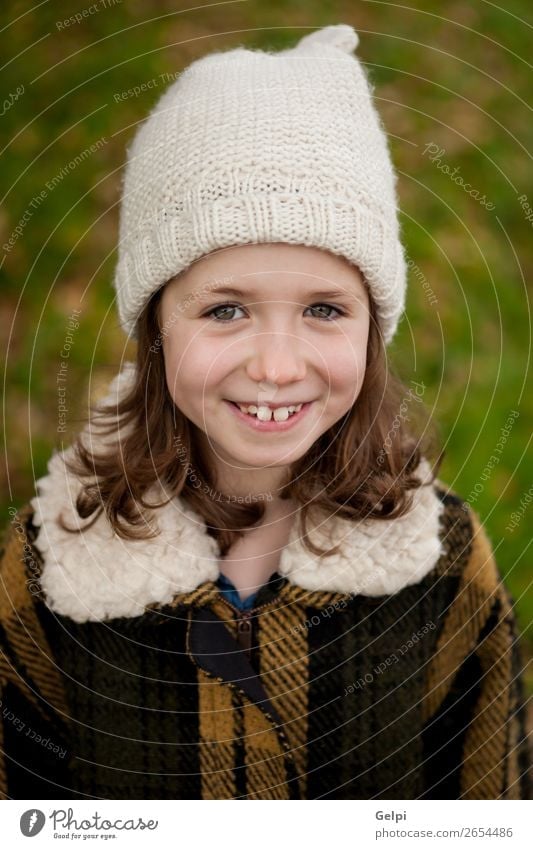 Pretty girl with wool hat in a park Joy Happy Beautiful Face Winter Garden Child Human being Toddler Woman Adults Family & Relations Infancy Nature Autumn