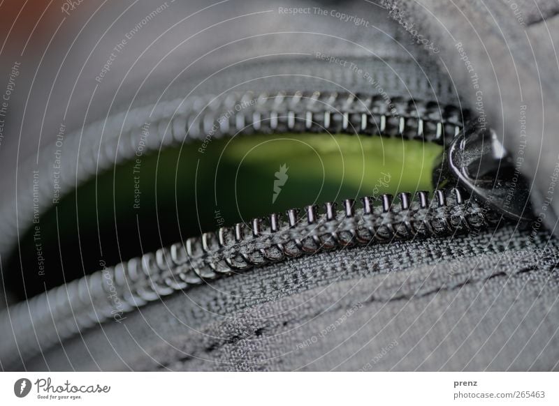 open to ... Cloth Bag Plastic Gray Green Black Zipper Open Stitching Dust Dusty Colour photo Exterior shot Deserted Copy Space bottom Day Shallow depth of field
