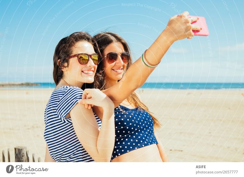 Holidays on the beach and selfies Joy Happy Vacation & Travel Tourism Summer Beach Ocean PDA Camera Technology Woman Adults Friendship Youth (Young adults)