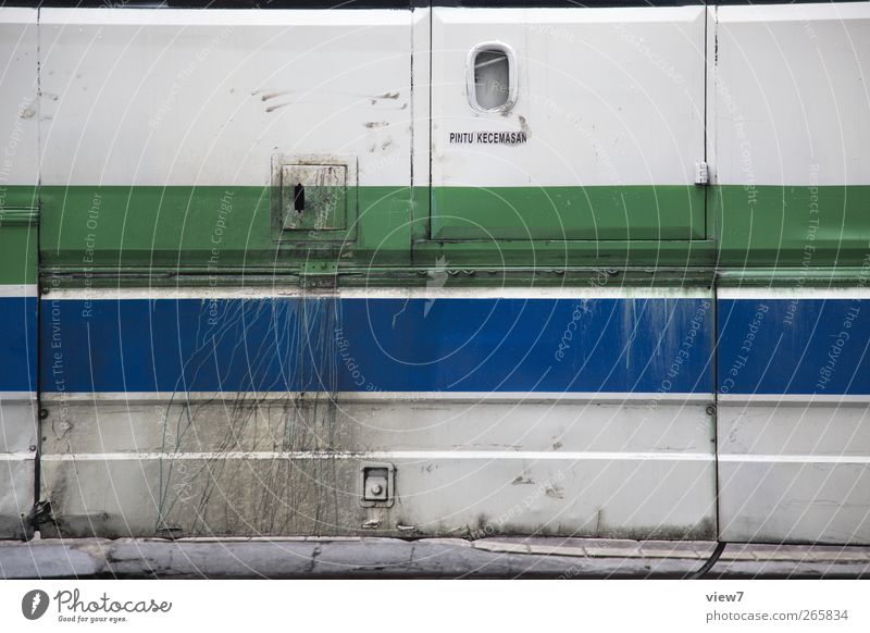 bus Wall (barrier) Wall (building) Facade Vehicle Bus Metal Line Stripe Old Authentic Simple Disgust Modern Gloomy Crazy Blue Multicoloured Green Beginning