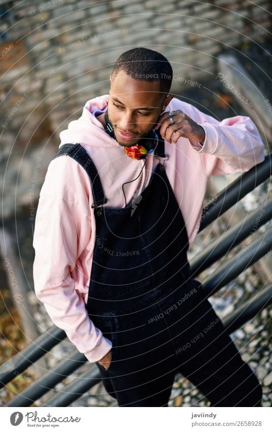 Smiling black man wearing casual clothes outdoors Lifestyle Happy Beautiful Human being Masculine Young man Youth (Young adults) Man Adults 1 18 - 30 years