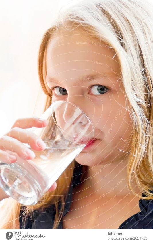 Caucasian girl drinking water Eating Drinking Lifestyle Child Schoolchild Woman Adults Infancy Blonde Blue White kid preschooler European eight nine Lady ten