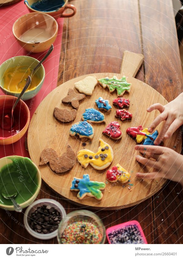 it starts again :-) Food Human being Hand Work and employment Baking Christmas biscuit Cookie Multicoloured Sweet Table Pierce Decoration Children`s hand Icing