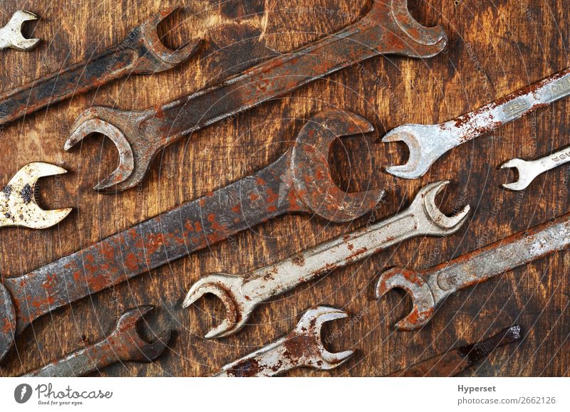 Metal bunch wrench rusty iron metal tools Table Work and employment Business Rope Man Adults Collection Wood Steel Rust Old Authentic Brown Antique background