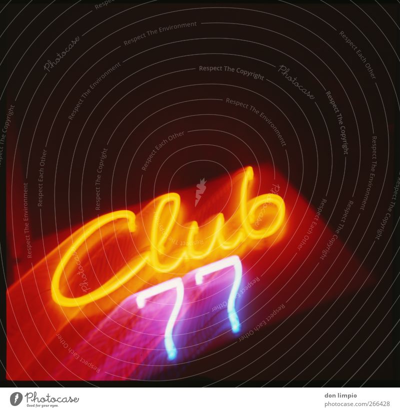 club77 Night life Club Disco Brothel Services Characters Digits and numbers Bright Multicoloured Illuminate Neon sign Illuminated letter Analog Colour photo
