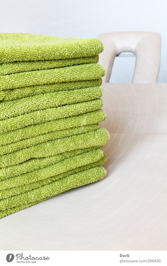 towels are well prepared on a pillow - patients welcome Towel Stack Green Wellness Physiotherapy Section of image Partially visible Central perspective Deserted