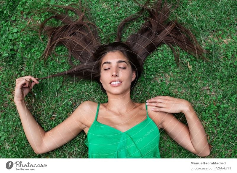 girl laying in grass