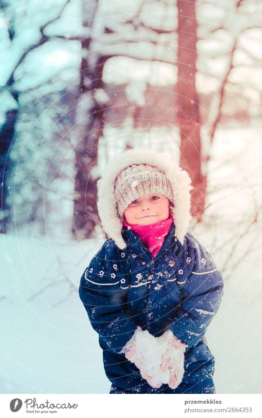 Little girl enjoying the snow on cold wintery day Lifestyle Joy Happy Winter Snow Winter vacation Human being Child Toddler Girl Infancy 1 3 - 8 years Nature