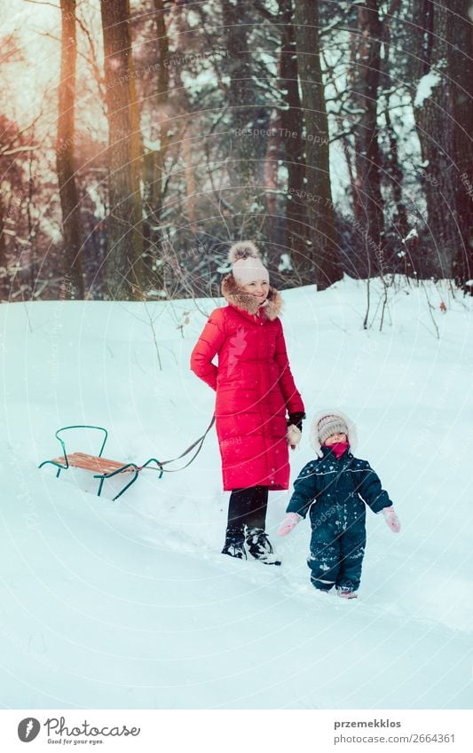Family spending time together walking outdoors in winter Lifestyle Joy Happy Winter Snow Winter vacation Human being Child Toddler Girl Young woman