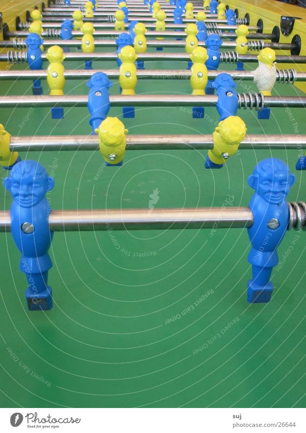 Table EM? Green Yellow Table soccer World Cup Photographic technology Blue Central perspective Blue-yellow Rod Many Row Side by side Behind one another