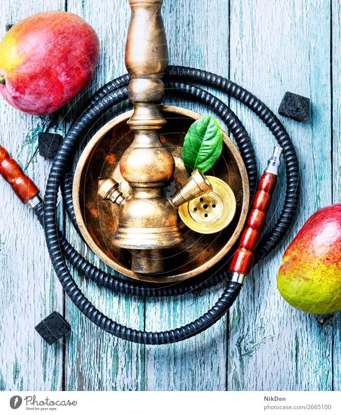 hookah with mango for relax tobacco smoking smoke shisha fruit mouthpiece pleasure hookah pipe relaxation hookah lounge arabic turkish east arabica style arabia